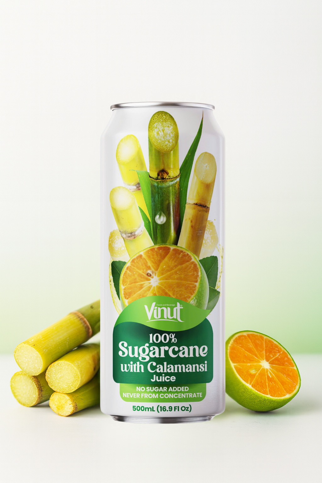 Sugarcane_2 A can of Vinut 100% Sugarcane with Calamansi Juice is shown with sugarcane stalks and a halved calamansi fruit beside it. The can is 500ml and labeled "no sugar added.